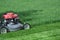 Emerald green lawn mowing landscape maintenance