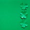 Emerald green paper clover shamrock leafs border frame
