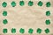 Emerald green paper clover shamrock leafs wreath border