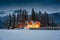 Emerald Lake with wooden lodge glowing in snowy pine forest on winter at Yoho national park