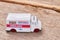 Emergency ambulance on wooden background.