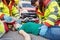 Emergency doctor ventilating injured woman after motorbike accident