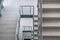 emergency and evacuation exit stairs in up ladder in new empty office building