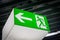 Emergency fire exit sign glowing green