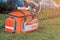 Emergency orange bag on grass