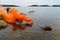 Emergency orange smoke in the sea