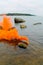 Emergency orange smoke in the sea