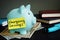 Emergency savings sign on the piggy bank