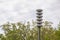 Emergency Siren Tower Alerting Tornado Warning in Rural Area