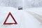 Emergency stop car on winter road in the countryside