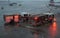 Emergency vehicles, or fire trucks, on tarmac at O`Hare Airport in Chicago in rainy weather
