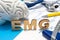 EMG medical abbreviation of electromyography concept, medical diagnostic research, which measures electrical impulses of muscles.