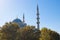 Eminonu Yeni Cami or New Mosque with autumn trees