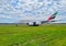 Emirates Airbus A380 airplane taxing on the runway at Manchester Airport.