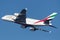 Emirates Airbus A380 four engined large passenger aircraft taking off from Sydney Airport