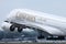 Emirates Airbus A380 taking off, close-up