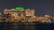 Emirates Palace illuminated at night timelapse, Abu Dhabi, United Arab Emirates