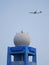 Emirates plane flying above meteorological radar in Curepipe, Mauritius