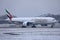 Emirates plane taxiing on Munich Airport, MUC, snow