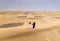 Emirati couple in a desert