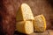 Emmental cheese triangle, Swiss cheese. piece of cheese maasdam with big holes. farmer market. banner, menu, recipe place for text