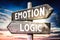 Emotion, logic - wooden signpost, roadsign with two arrows