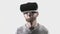 Emotion smile happy man wearing virtual reality goggles. VR headset. look up