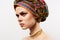 emotional cheerful woman with a turban on her head traditional clothing studio close-up