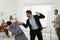 Emotional colleagues fighting in office. Workplace conflict