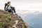 Emotional ginger guy with a dog on his knees watching the amazing view