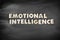 Emotional Intelligence word, business concept on blackboard