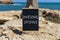 Emotional intimacy symbol. Concept words Emotional intimacy on beautiful black chalk blackboard. Beautiful stone beach blue sea