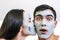 Emotional large portrait of a married couple in masks for the face of clay. day Spa, Wellness, skincare