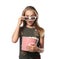 Emotional little girl with cup of popcorn wearing 3D cinema glasses on white background