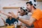 emotional multicultural group of male football fans gesturing by hands and watching soccer match