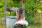 Emotional portrait of a little girl with long hair, summer day