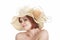 Emotional portrait of a naked girl and hat on white background.