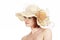 Emotional portrait of a naked girl and hat on white background.