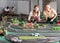 Emotional portrait of two women playing slot car racing