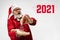 Emotional Santa Claus in eyewear greeting with New Year 2021 and Christmas. Copyspace