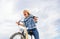 Emotional woman enjoy biking holidays. Lady cyclist with cruiser bike. Girl spend leisure riding bicycle. Latest news