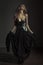 emotional woman posing in evening dress