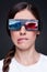 Emotional young woman in 3d glasses