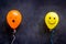 Emotions concept - happiness and overload sleepiness on the colored ballons