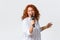 Emotions, lifestyle and leisure concept. Passionate and carefree redhead female performer, middle-aged woman singing