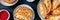 Empanadas dinner panorama on a dark rustic wooden background