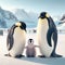 Emperor penguins look over their new off-spring