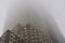 Empire State Building disappears into low cloud deck