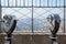 Empire State Building observation deck with binoculars in New York