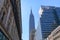 Empire State Building seen rising behind the Macy\'s building in Midtown Manhattan